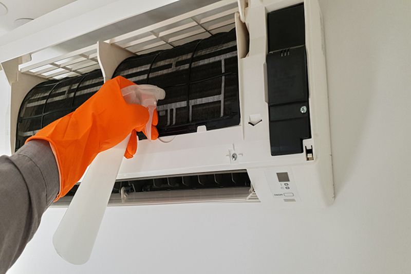 What Maintenance Is Needed for a Ductless System? - Maintenance Person Cleaning Duct.
