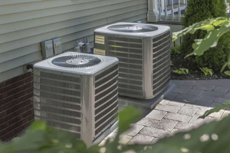 How to Choose the Best HVAC System for Your Home. Image shows HVAC unite outside of home.